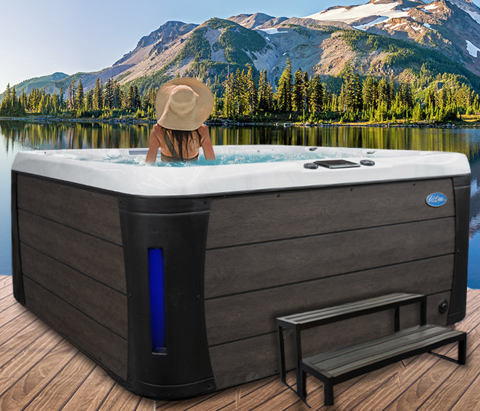Hot Tubs, Spas, Portable Spas, Swim Spas for Sale Calspas hot tub being used in a family setting - hot tubs spas for sale Sonora